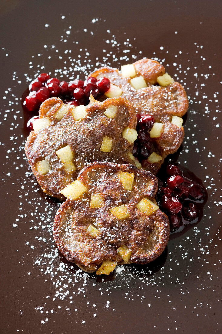 Baked chocolate and apple blini with spicy cranberry sauce