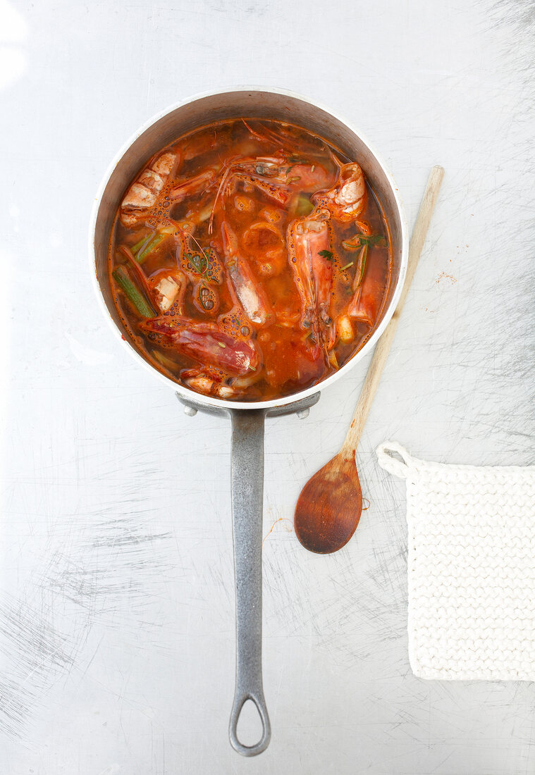 Crustacean shells with water in pot