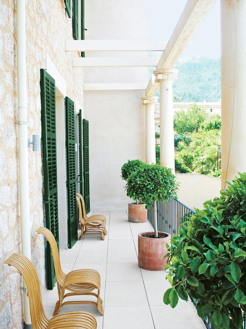 Designer chairs on terrace of L'Avenida Hotel, Soller, Mallorca island, Spain