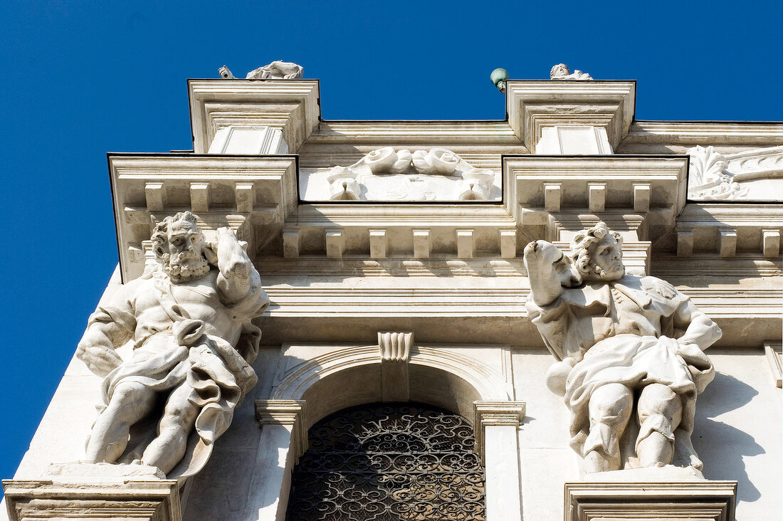 Low angle view of sculptures of Santa Maria dei Derelitti church in Venice, Italy