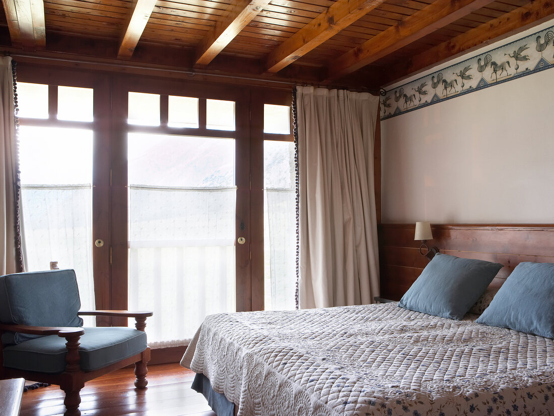 Peasant styled bedroom in Hotel Garos Ostau, Spain