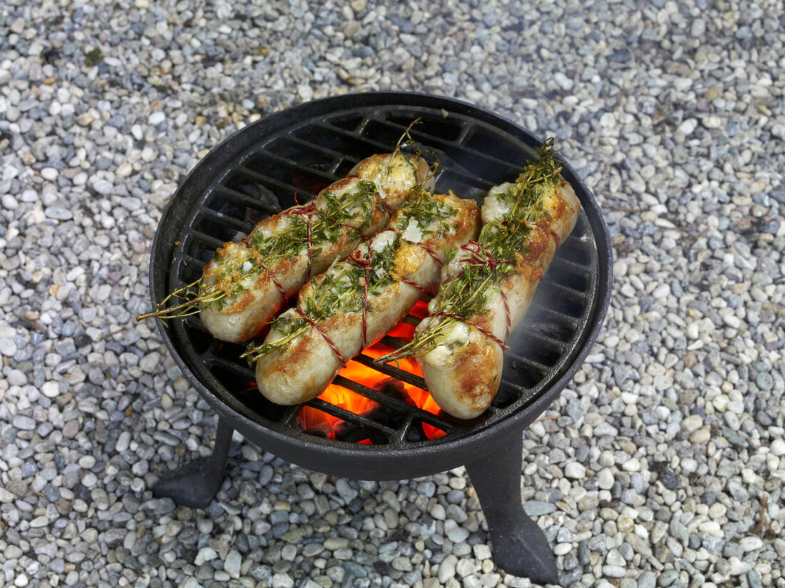 Thyme pecorino sausages for grilling on barbecue