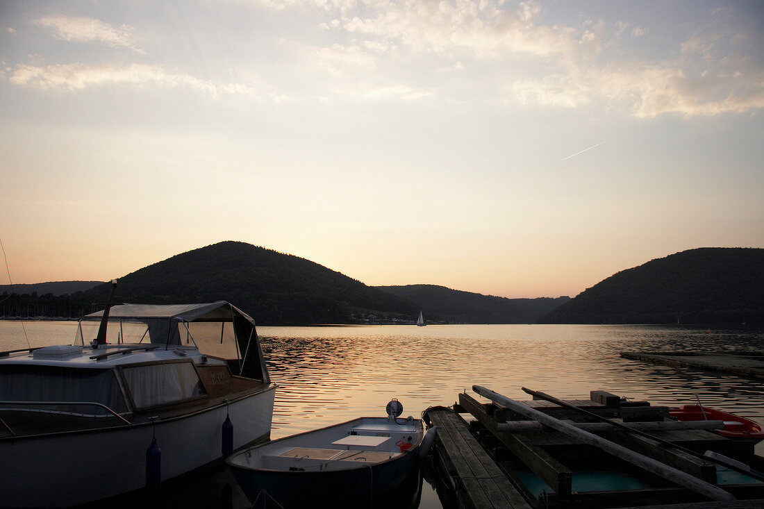 View of harbour in National park Kellerwald-Edersee at sunset, Hesse, Germany