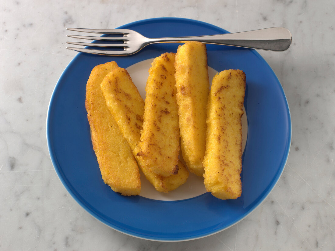 Fried polenta on plate