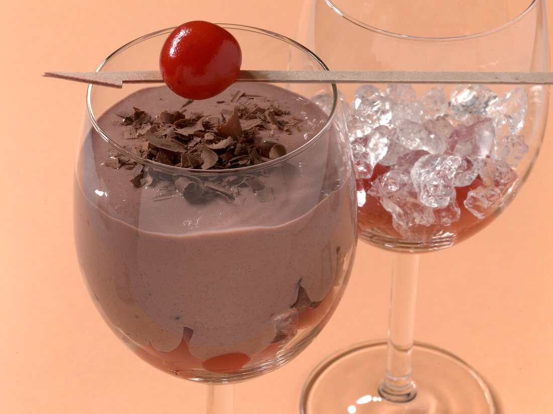 Close-up of ice and spice chocolate drink in glass