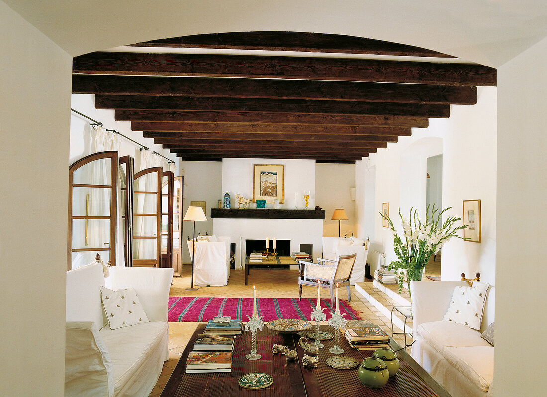 View of salon with sofas and table in Spanish villa