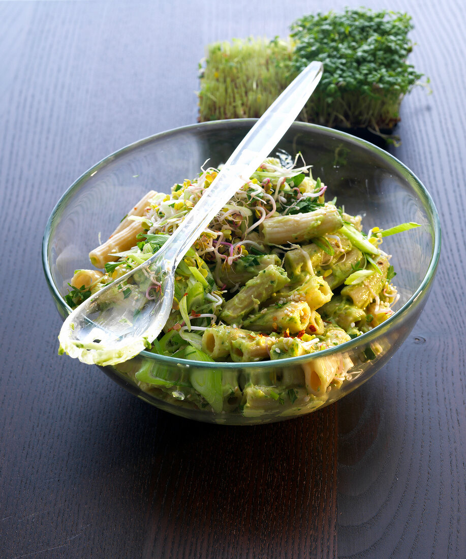Spelt pasta salad with pesto in bowl