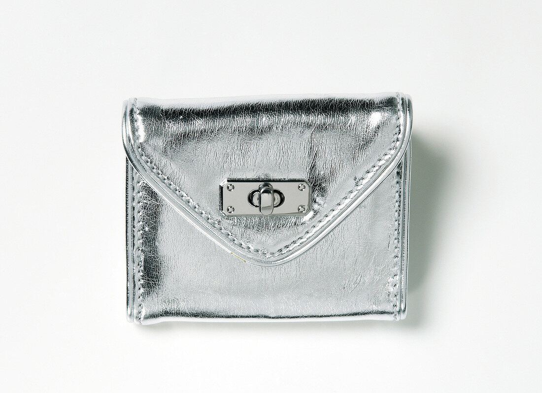 Close-up of silver wallet on white background