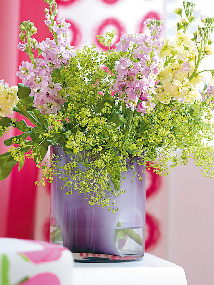 Levkojen, yellow, pink, lady's mantle, purple glass vase