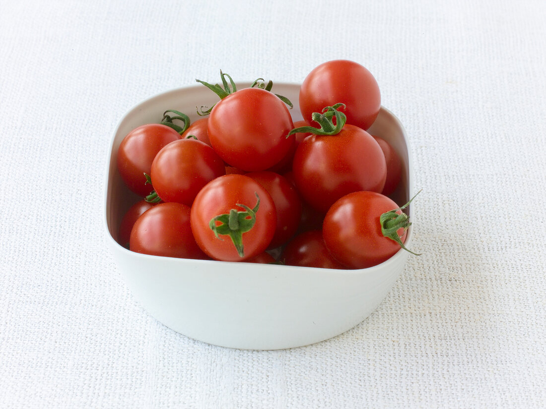 Bowl with small red cherry tomatoes
