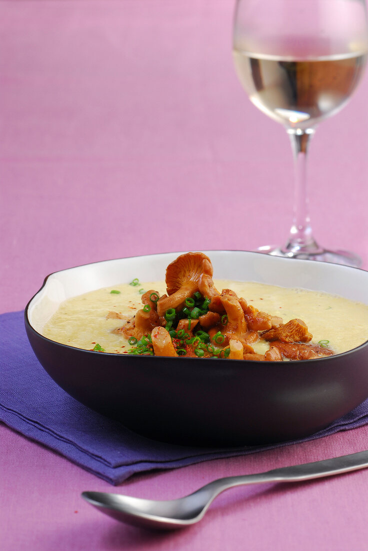 Bowl of corn soup with chanterelles