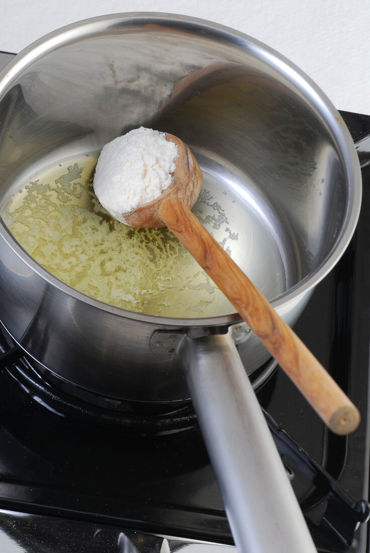 Close-up of flour being sauteed in pan, step 1