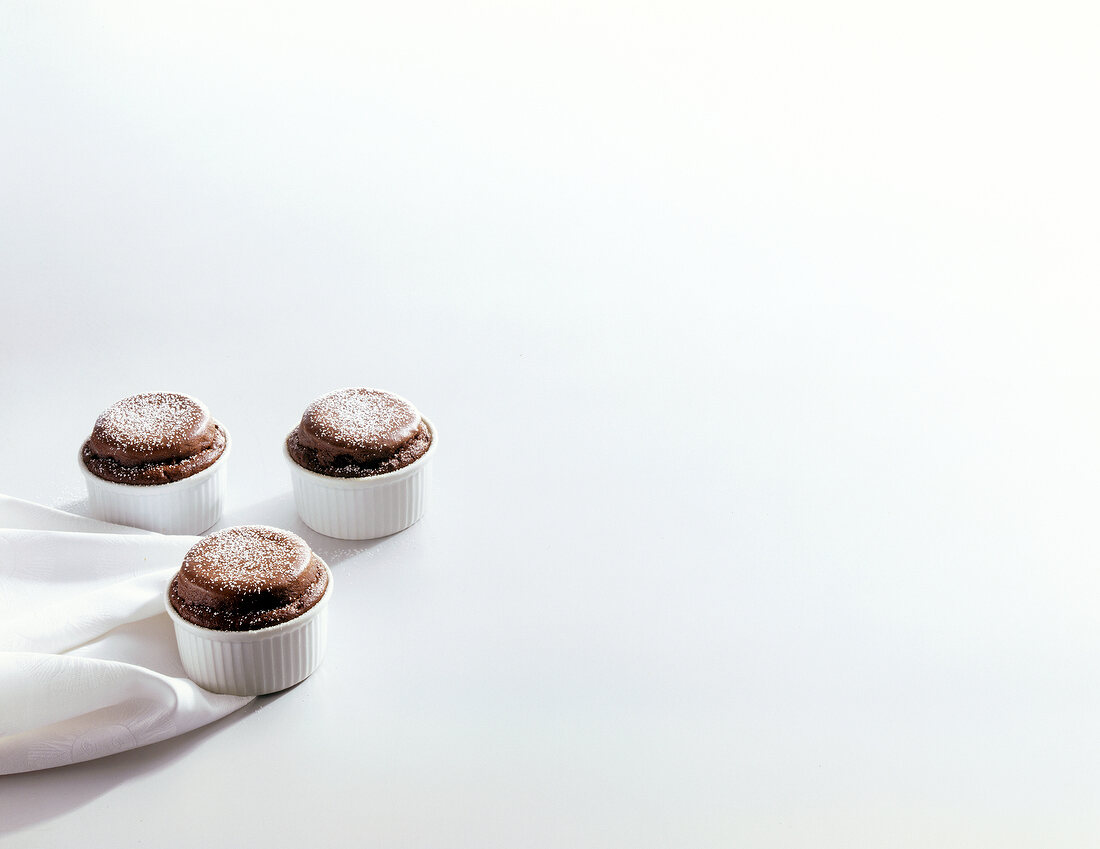 Three chocolate souffle with sugar icing