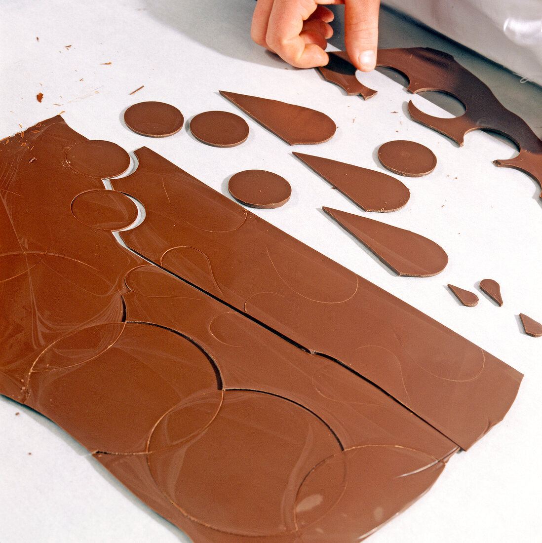 Various shapes cut out from chocolate, step 2