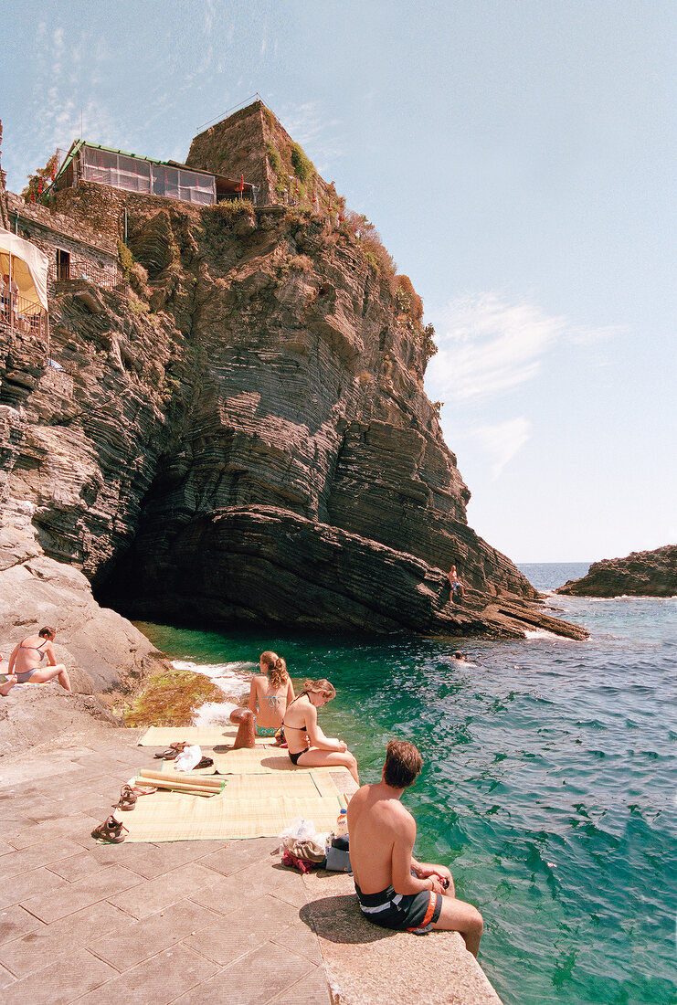 View of tourist at bay in Manarola at Cinque Terre, Italy