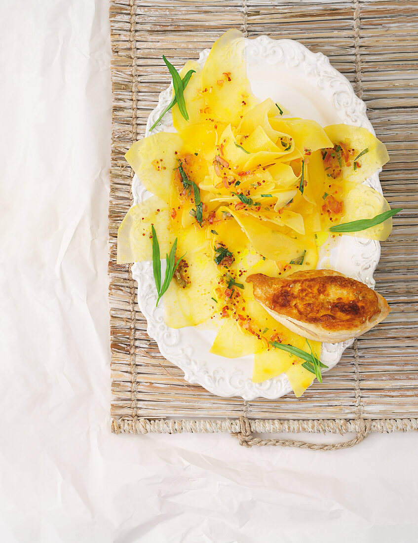 Rutabaga with honey and chicken breast on serving dish