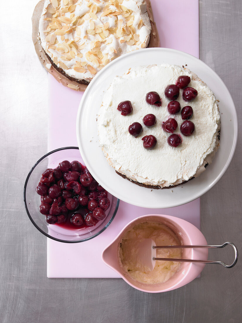 Ingredients being assembled on plate for meringue layer, overhead view