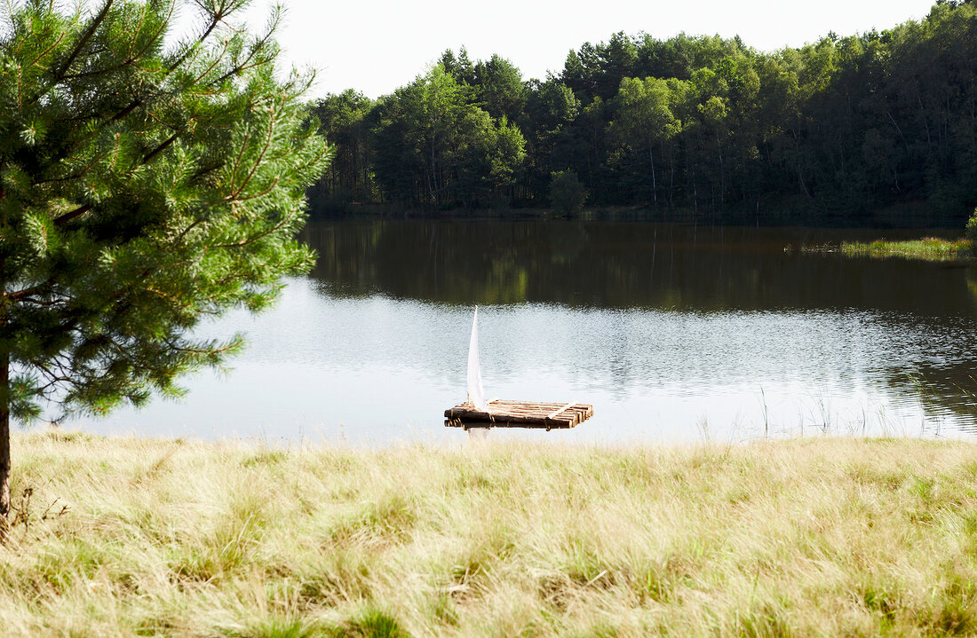 Raft floating on lake in the Luneburg Heath, Germany