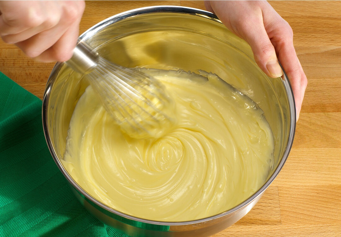 Butter being whisked till smooth, step 2
