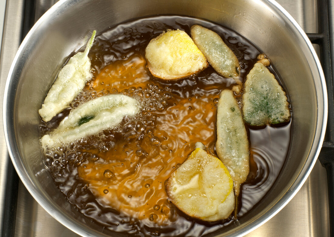 Petals being fried in pot, step 5