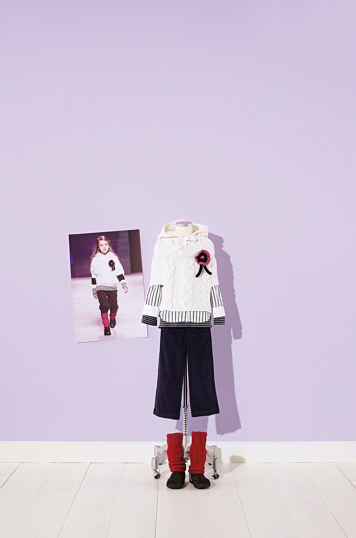 Designer woollen clothing for children on mannequin