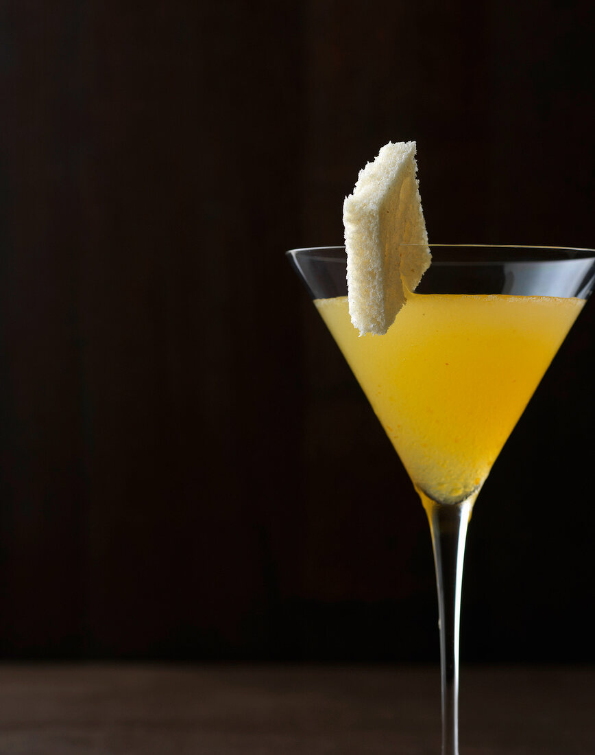 Breakfast martini with toast on rim in martini glass