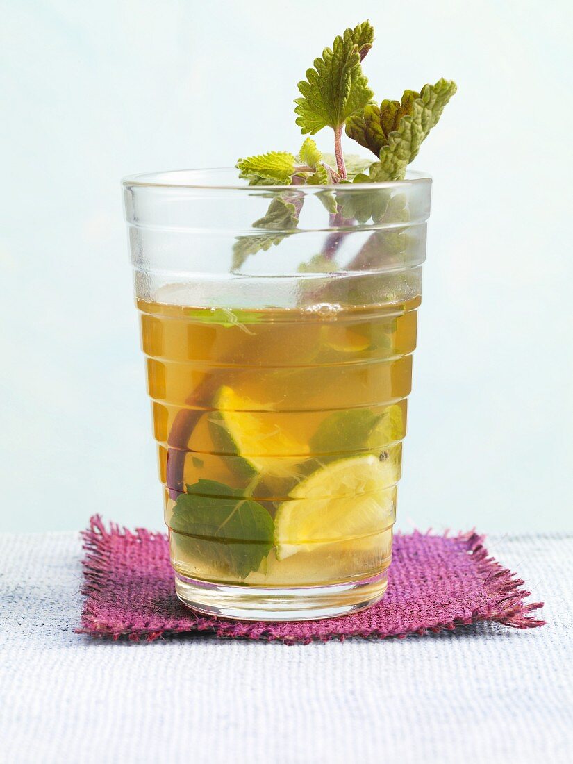 Mint tea Mojito with a sprig of peppermint and limes