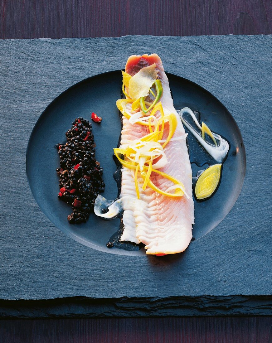 Whitefish fillet with caviar lentils