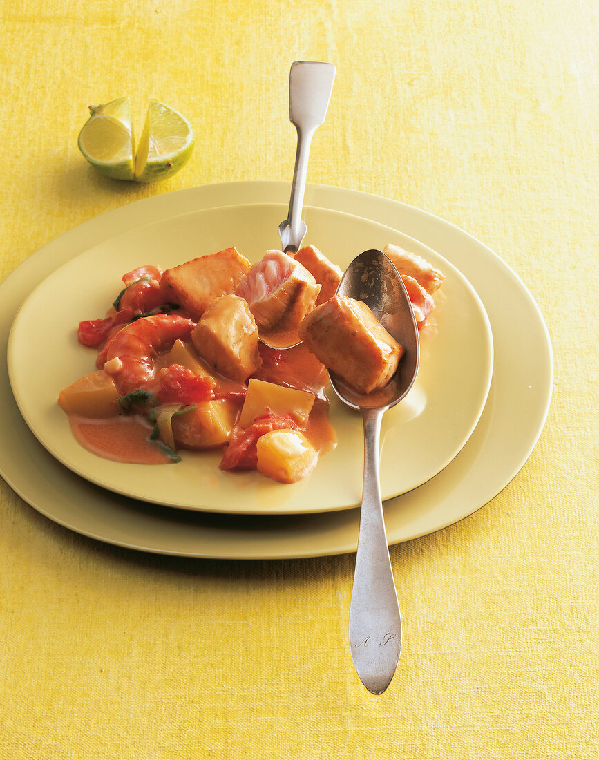 Catfish with coconut sauce on plate