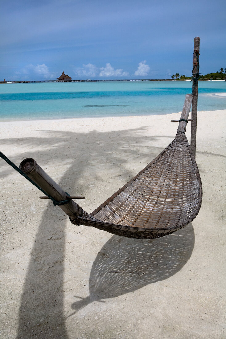View of hammock and sea in Dhigufinolhu Island, Maldives