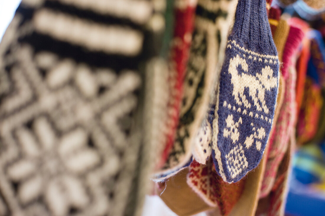 Close-up of colourful woollen gloves