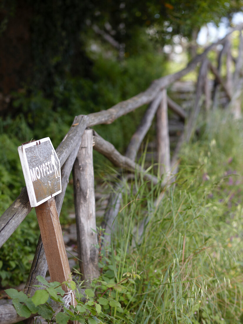 Footpath signpost and wooden fence on Pelion Mountain, Eastern Magnesia, Greece