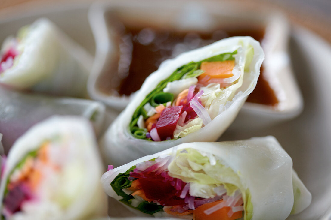 Close-up of vegetable wraps with sauce