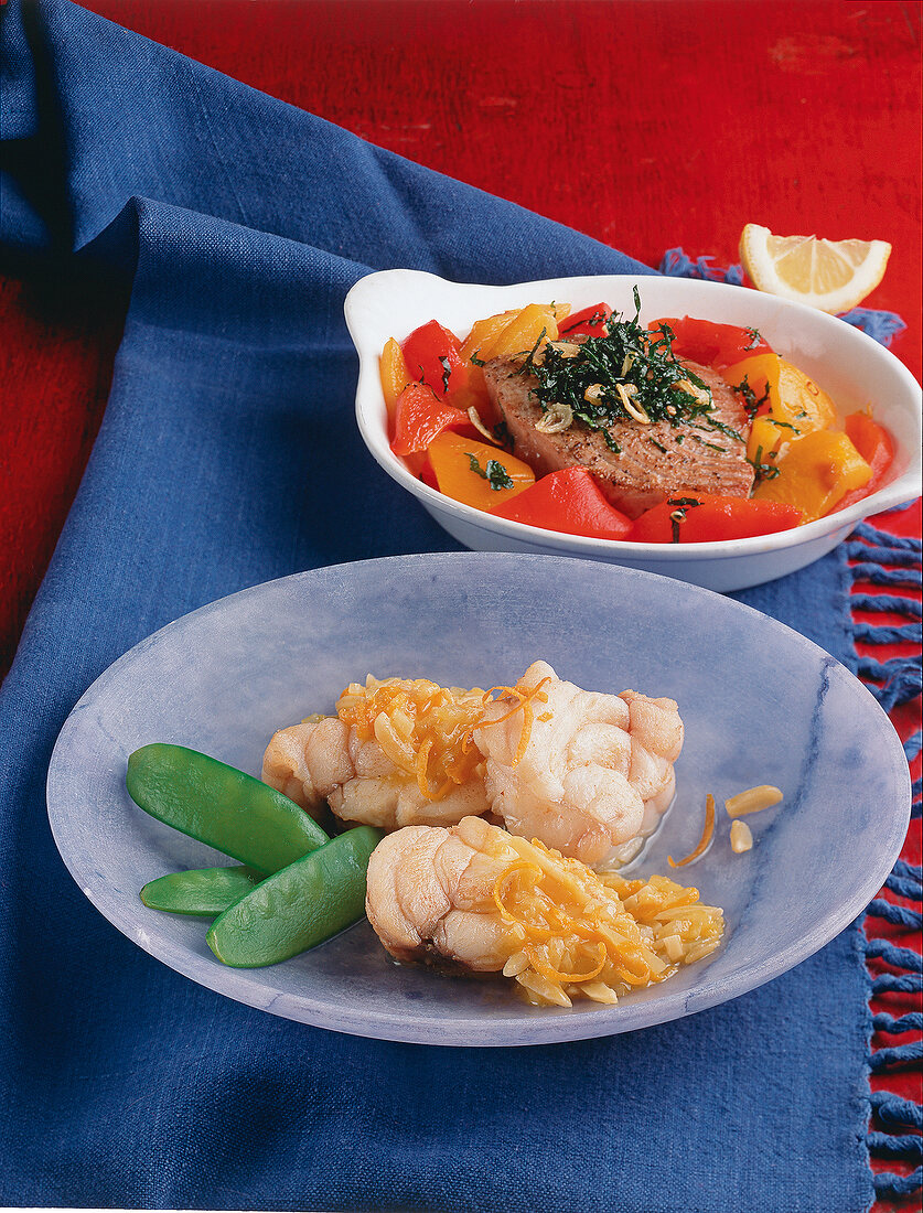 Basque tuna and paprika monkfish with almond and cheese on plate