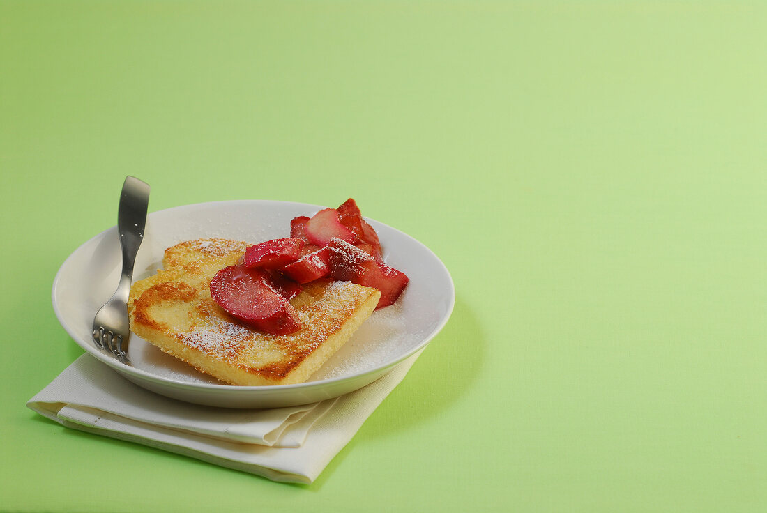 Toast with rhubarb compote on plate