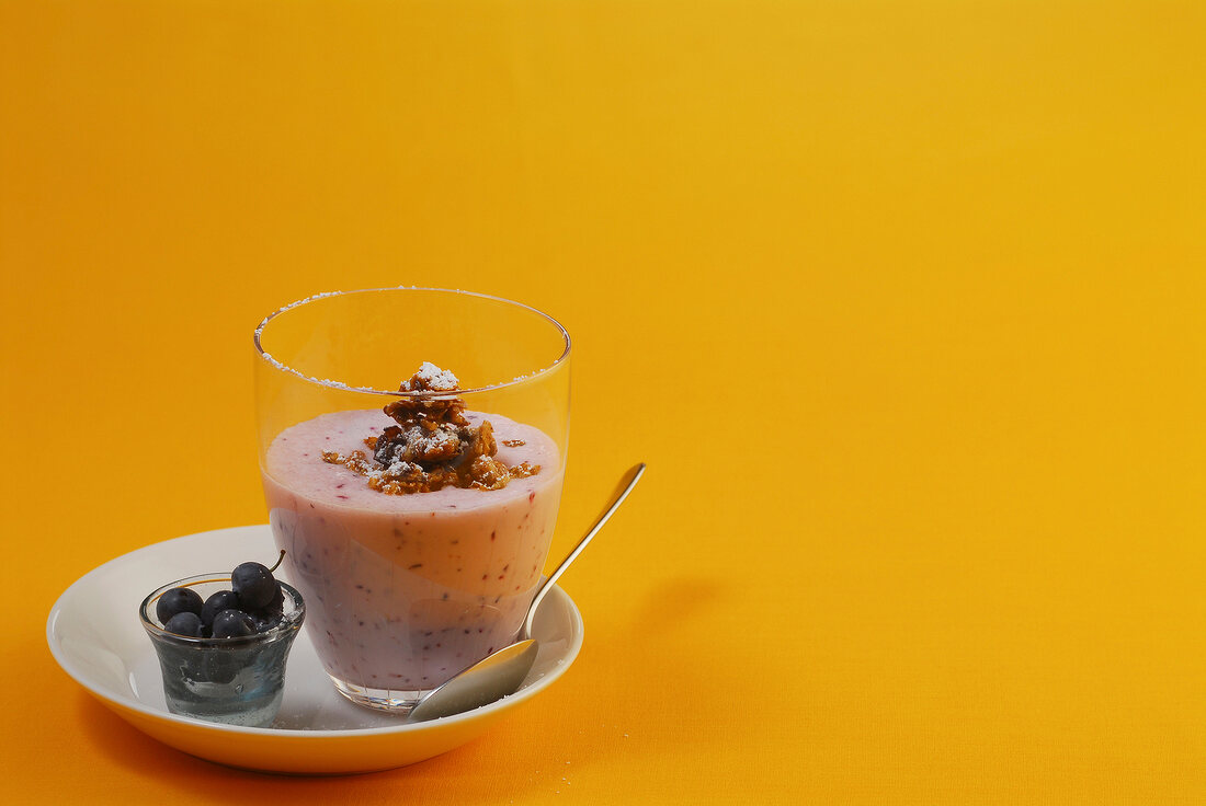 Blueberry gazpacho with crunchies In glass