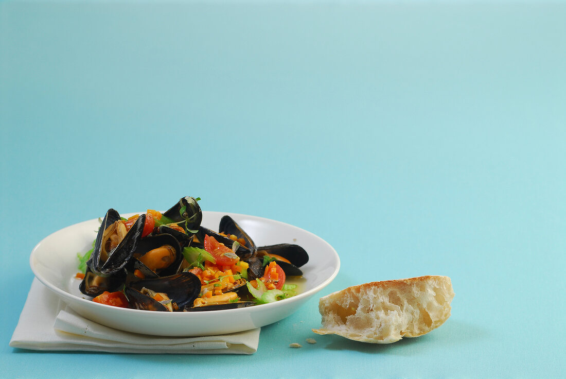 Mussels in cider sauce on plate