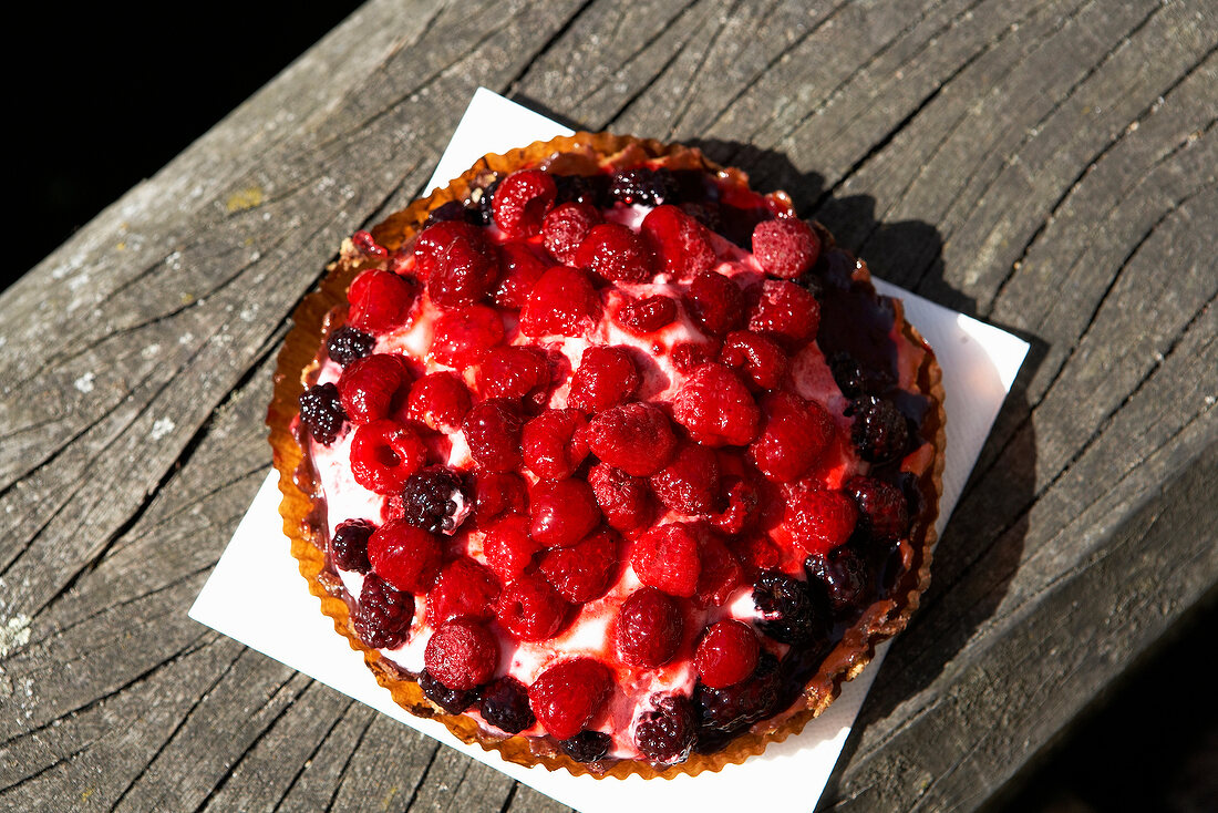 Fruit cake with strawberries, raspberries and blackberries
