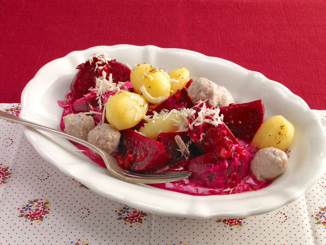 Beets, Potatoes dumpling and potatoes in serving dish