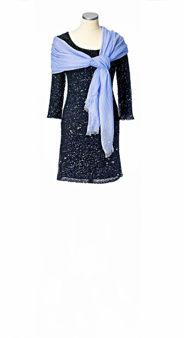 Black sequin dress with purple scarf on mannequin against white background