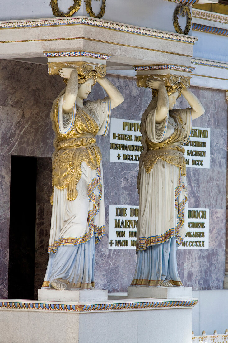 Gold plated caryatids in Regensburg, Bavaria, Germany