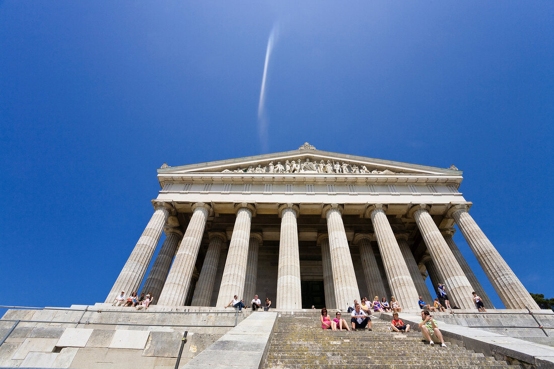 People sitting on staircase of The Walhalla in Regensburg, Germany