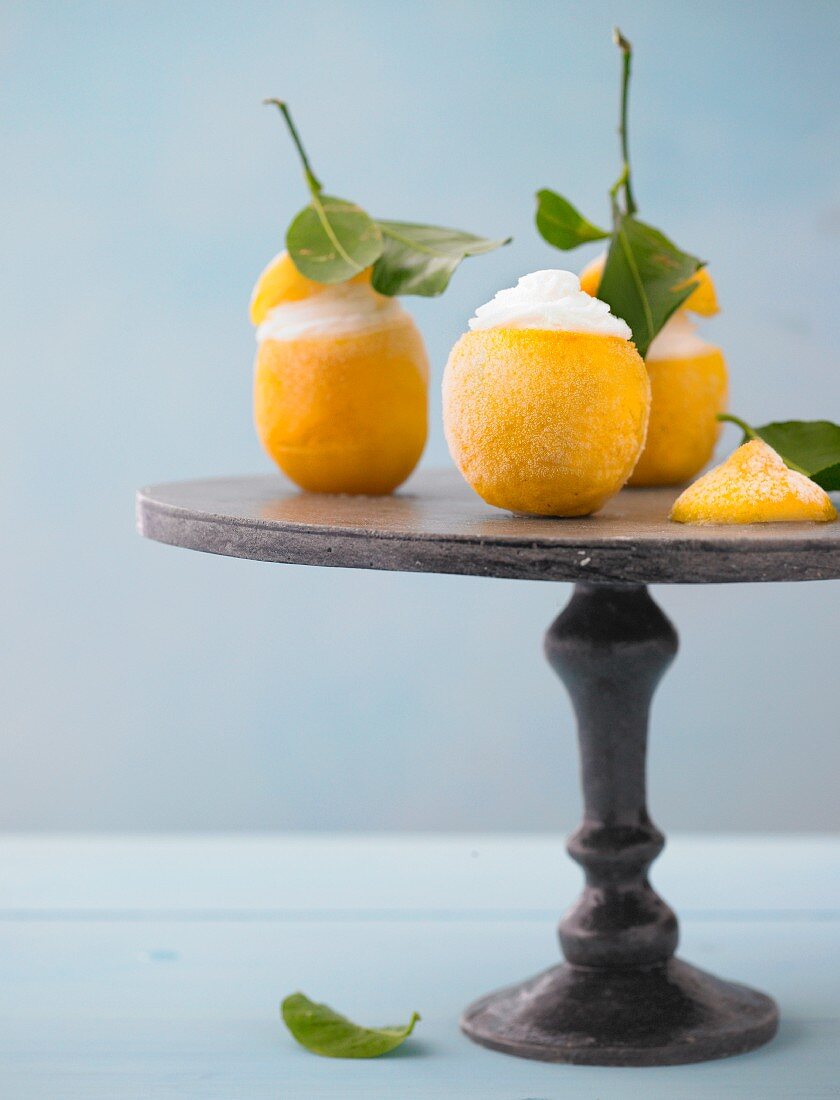 Lemon frozen dessert with filled cream kept on serving dish