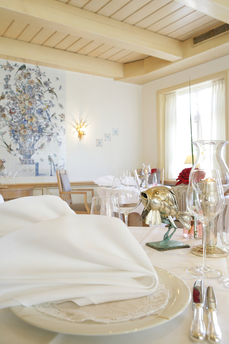 Interior of restaurant with laid tables in Germany