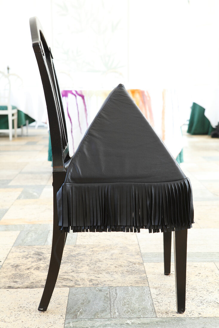 Black pyramid chair with fringe in Mielcke and Hurtigkarl, Copenhagen, Denmark