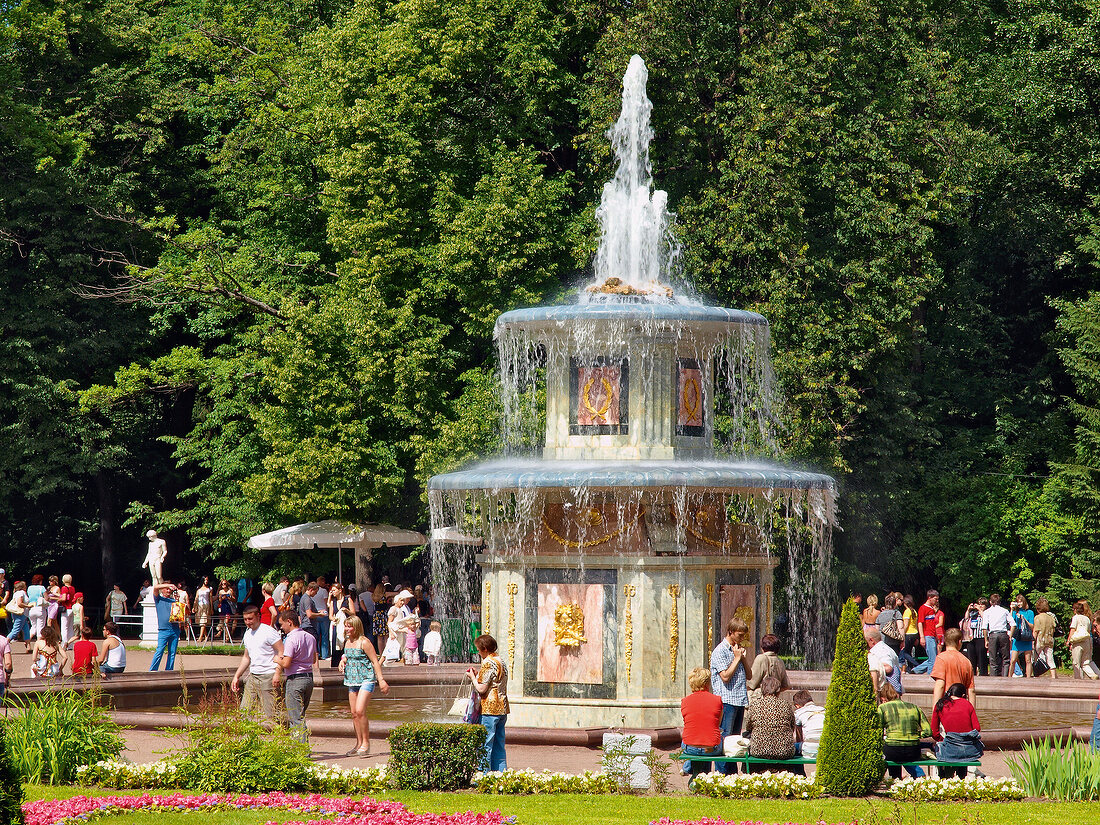 Tourist around Peterhof Roman fountain in Saint Petersburg, Russia