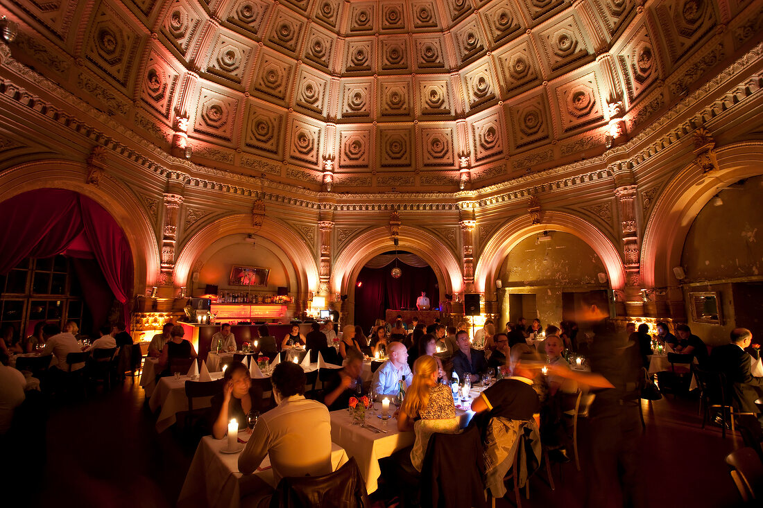 People dining at restaurant with insulated dome light, Berlin, Germany
