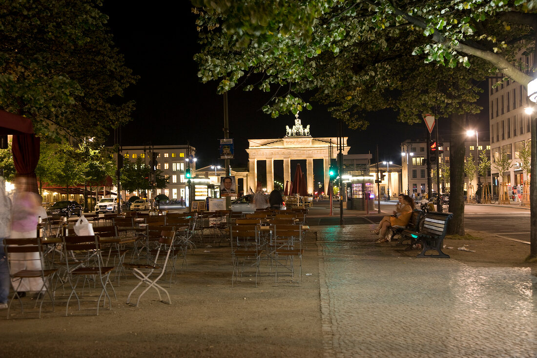 Tables set at Brandenburg Gate and Pariser Platz in evening, Berlin, Germany