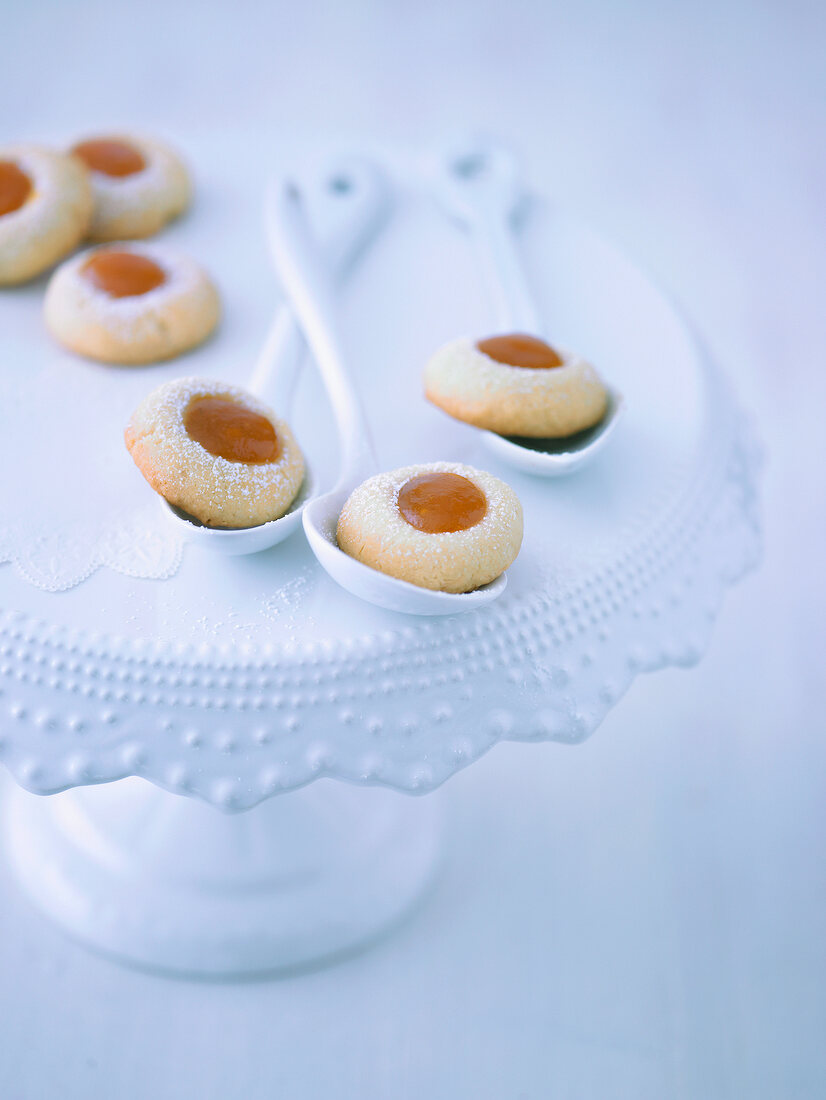 Close-up of walnut cookies in spoons