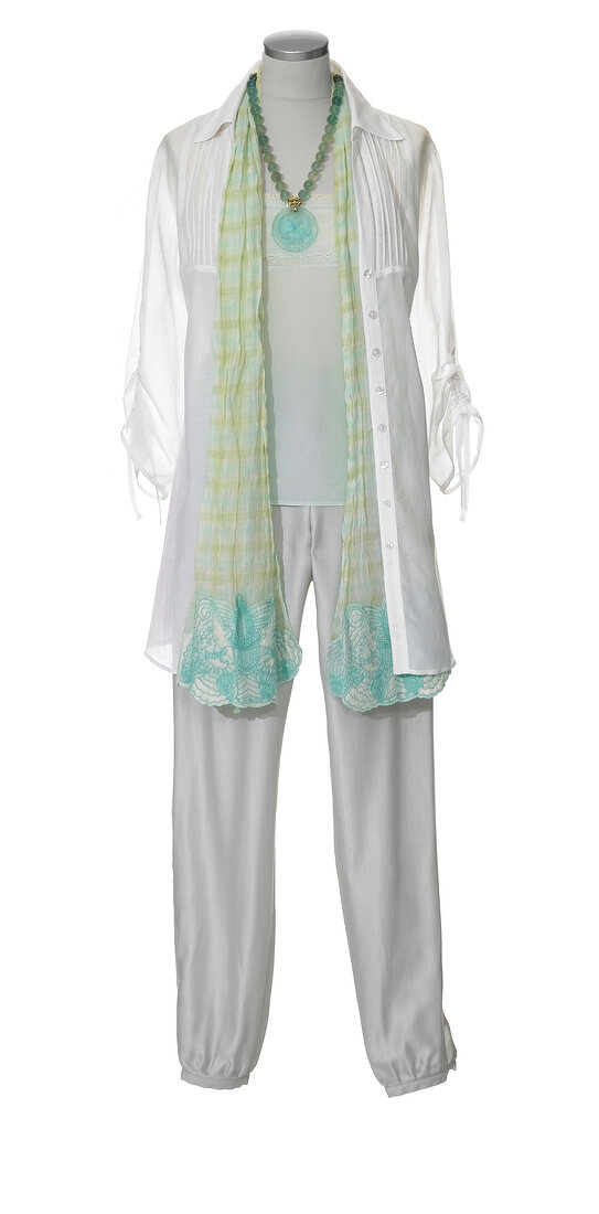 White long blouse with silk scarf and bloomers on white background